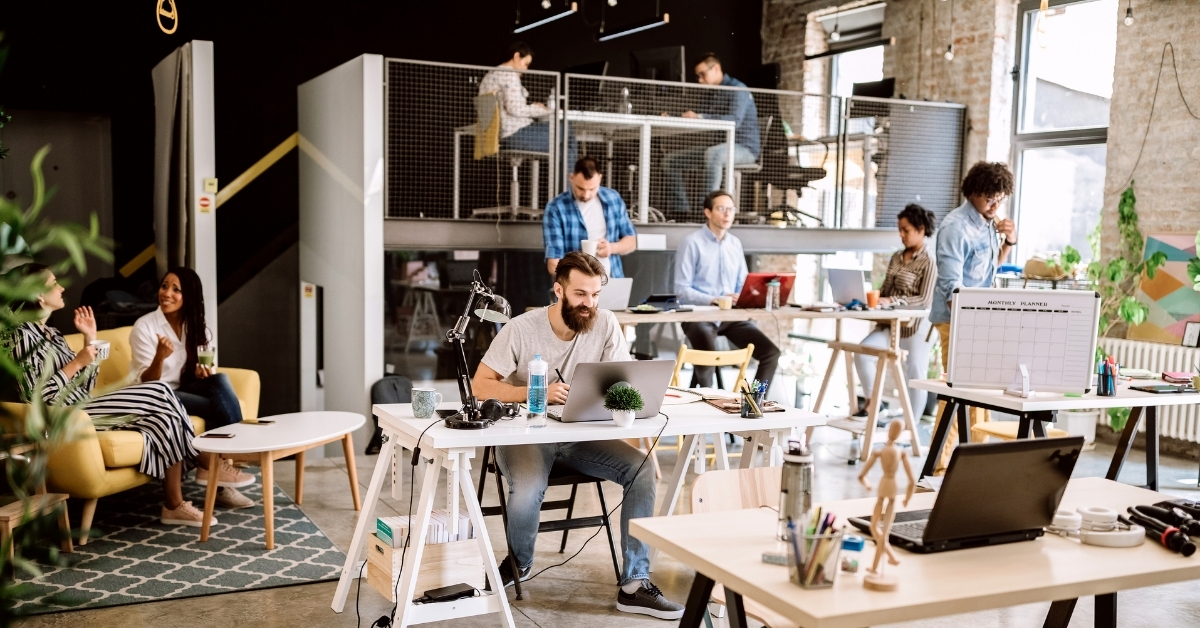 People working in a busy coworking space